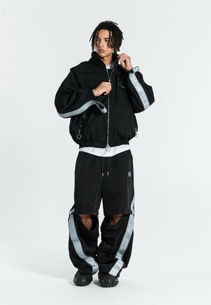 MWM, MW084071204 UNISEX - Chaqueta de entretiempo - black