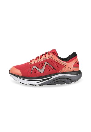 Red athletic shoe with a mesh upper, contrasting orange accents, and a curved black and white sole. Features a wavy pattern on the side.