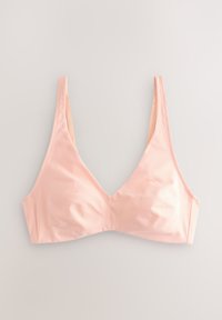 Soutien-gorge en tissu doux rose clair avec fines bretelles, sans armatures, et un design simple à coupe triangulaire, posé à plat sur un fond clair.