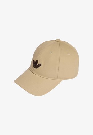 Beige baseball cap with six ventilation eyelets and a brown Adidas trefoil logo embroidered on the front panel.