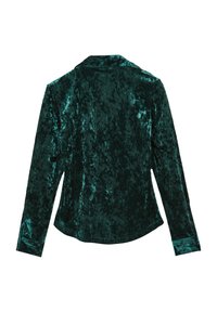 Green velvet shirt with a collar, long sleeves, and textured surface. Features a smooth finish and tailored design, showing back view.