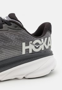 HOKA CLIFTON YOUTH UNISEX - Športni copati - black/white