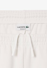 Lacoste INTERLOCK CONTRAST - Pantalones deportivos - flour