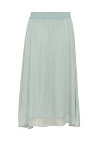 Gonna leggera e fluente di colore azzurro, realizzata in tessuto trasparente, con una cintura elastica e un design a strati, caratterizzata da un sottolivello leggermente più lungo.