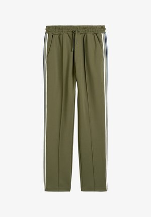 Olivgrüne Hose mit elastischem Bund und Kordelzug. Verfügt über weiße Streifen an den Seiten. Hergestellt aus weichem Stoff mit Seitentaschen.