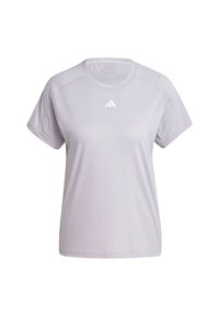 T-shirt lavande clair en tissu doux, avec manches courtes, col rond, et un logo Adidas blanc sur la poitrine.