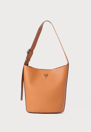 Tan leather bucket bag with a smooth texture, adjustable brown strap, and a triangular logo accent. Features a minimalistic design.