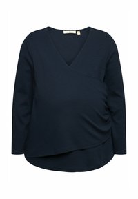 Navyblaues Langarmoberteil mit V-Ausschnitt und Überkreuzdesign. Mit gerafftem Seiten-Detail für eine figurbetonte Silhouette. Weicher Stoff.