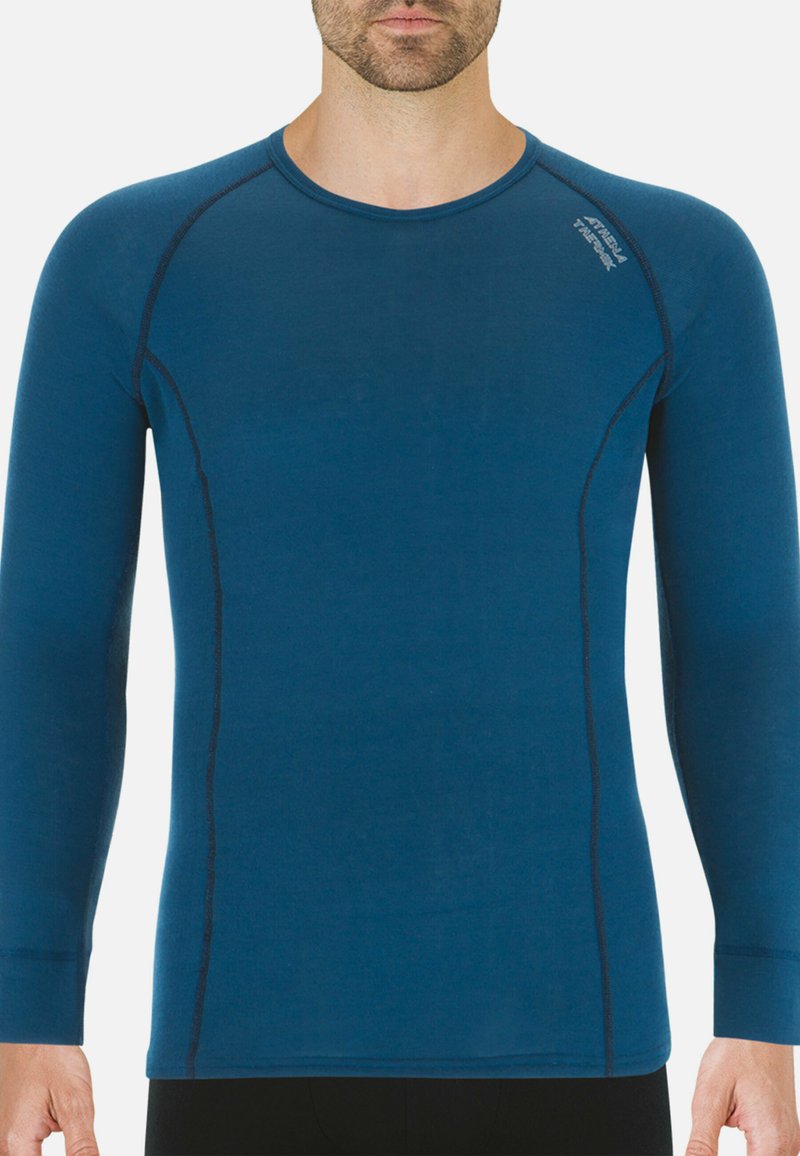 T-shirt thermique à manches longues de couleur bleu foncé, avec un col rond, des coutures contrastantes et une coupe ajustée, fabriqué à partir d'un matériau doux et respirant.