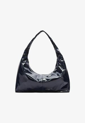 Navyblaue, patentierte Hobo-Tasche mit glatter Oberfläche, gebogenem Henkel und dezentem Logo-Detail am Boden.