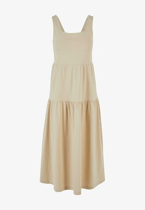 Beige bomulls klänning med fyrkantig halsringning, vida axelband och volangkjol. Slät textur, golvlång, enkel silhuett.