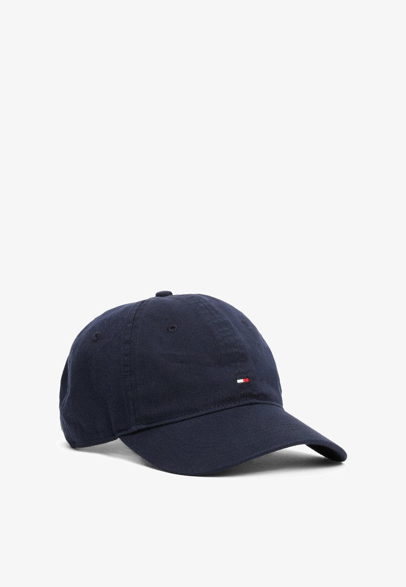 Navy blue cotton baseball cap featuring a curved brim and a small Tommy Hilfiger logo with red, white, and blue detailing.