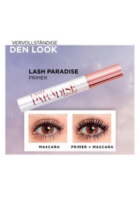 Lash Paradise primer-tube med sammenligning af vipper: en med kun mascara, en med primer plus mascara, der viser fyldigere vipper.