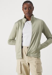 Peak Performance RIDER TECH ZIP JACKET - Sweater met rits - limit green