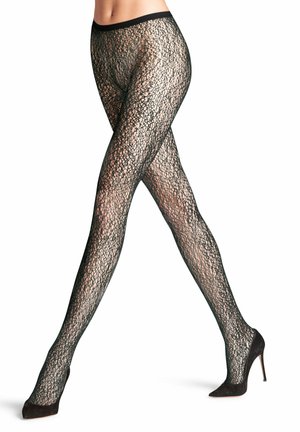 Collant neri in pizzo con un delicato motivo aperto, abbinati a scarpe nere con tacco alto, caratterizzate da una vita liscia e una consistenza trasparente.