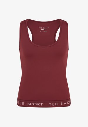 Sarkans sporta tērps no elastīga auduma. Tam ir apaļa izgriezuma kakla daļa un aizmugurē racerback dizains. Uz jostas vietas ir logotips un zīmola nosaukums.