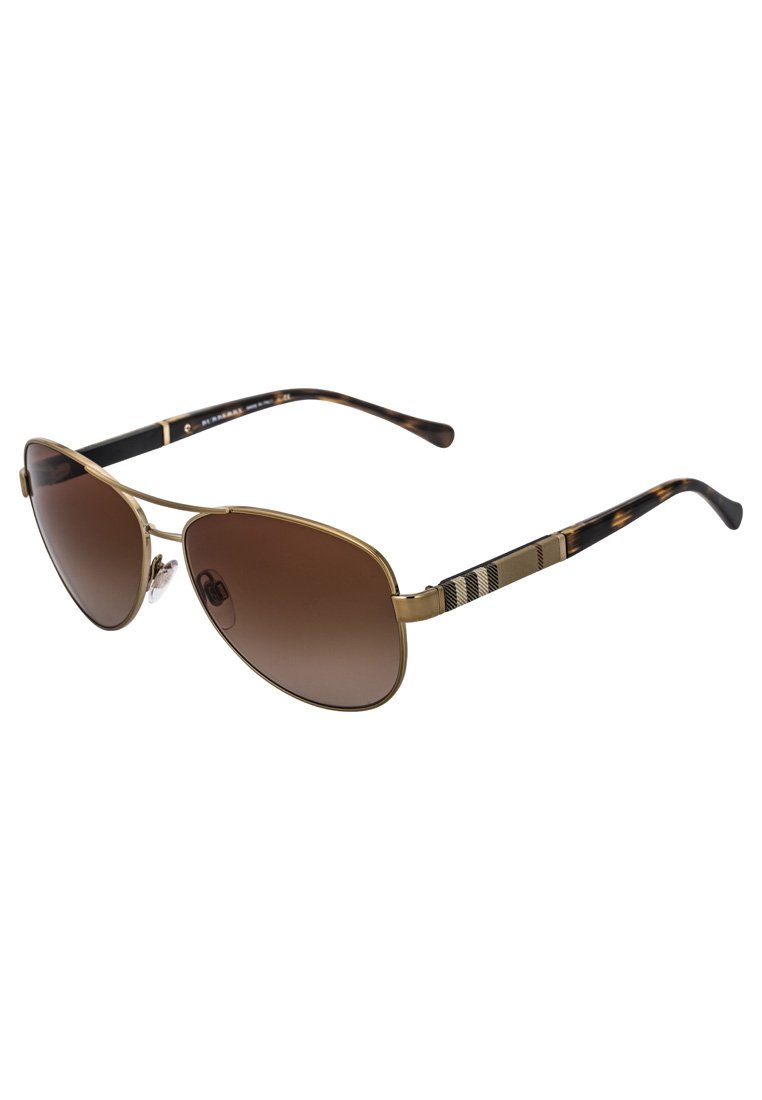 Gold metal aviator sunglasses with brown gradient lenses, black tortoiseshell arms, and a striped pattern on the temple.