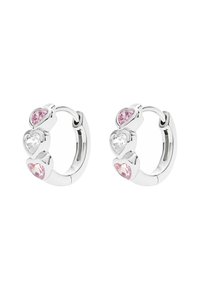 Silverfärgade hoops i öronen med fyra hjärtformade kristaller i rosa och klart. Slät yta med en säker gångjärnsstängning.