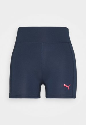 Shorts de sport navy en tissu extensible, avec une taille haute et un logo Puma rose en bas à gauche.
