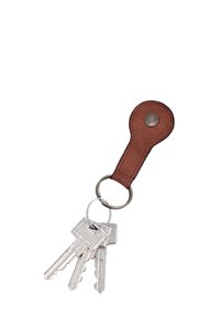 Three silver keys on a round metal keyring attached to a brown leather key fob with a metal button.