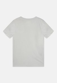 Kortärmad t-shirt med rund halsringning i ljusgrått. Materialet är bomull med en mjuk textur. Inga synliga mönster eller detaljer.