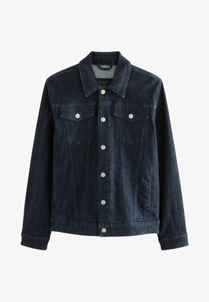 Tume sinine teksajakk, millel on nööbiga esiosa, kaks rinnaeest taskut klappideta ja hõbedased detailid. Omab klassikalist kaelust ja mansettidega varrukaid.