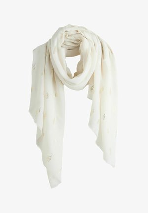 Valge sall, mis on valmistatud pehmest kangast ja kaunistatud õrna kuldlehe tikandiga. Omab kerget, voolavat disaini ning ääristatud narmastega.