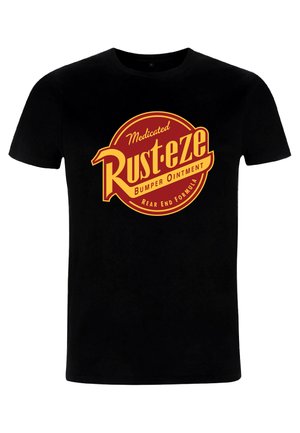 T-shirt en coton noir avec un graphique circulaire rouge et jaune portant le texte "Pommade Medicated Rust-eze Bumper Formula pour arrières".