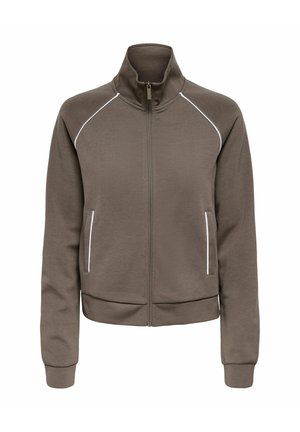 Veste marron à fermeture éclair, col montant, manches longues, poignets côtelés, passepoils blancs aux épaules et poches avant avec bordure blanche, présentée sur fond blanc.