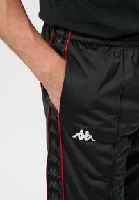 Kappa BANDA ASTORIA - Pantaloni de trening - black racing red