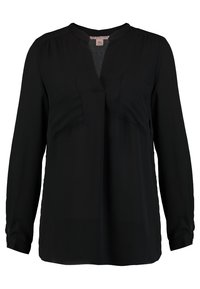 Blusa nera a maniche lunghe con scollo a V, due tasche frontal, tessuto morbido e vestibilità comoda. Design semplice senza motivi o dettagli aggiuntivi.