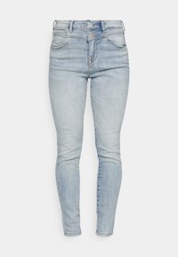 Vaaleansiniset skinny-farkut, valmistettu denimistä. Ominaisuuksiin kuuluu korkea vyötärö, viisi taskua ja lievä kulutus vaikutus rakenteeseen.