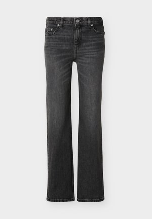 Μαύρο τζιν με bootcut, μπροστινές τσέπες, θηλιές για ζώνη και διακριτικές ξεθωριασμένες λεπτομέρειες στο ύφασμα.