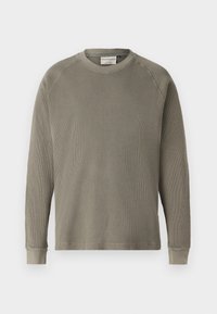 Grüner Sweatshirt mit langen Ärmeln, strukturiertem, geripptem Material, rundem Ausschnitt und Bundärmeln. Verfügt über Raglanärmel für mehr Bewegungsfreiheit.