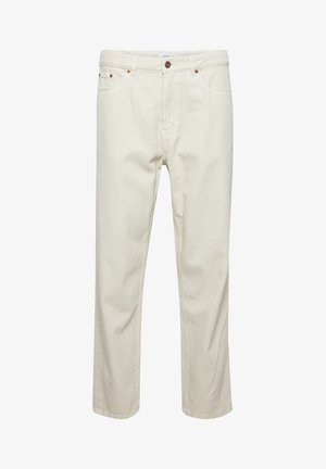 Vaaleat puuvillahousut suoran leikkauksen omaavina, viidellä taskulla, napilla suljettuna ja hienovaraisilla ompeluyksityiskohdilla. Tasainen pinta ilman näkyviä kuvioita.