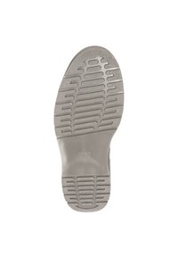 Suola di scarpa in gomma grigia con superficie texturizzata e scanalature per trazione, forma arrotondata e logo al centro in basso.