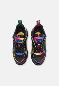 Black sneakers with a chunky sole, featuring colorful accents, layered textures, and black laces; branding on tongue and heel tab.