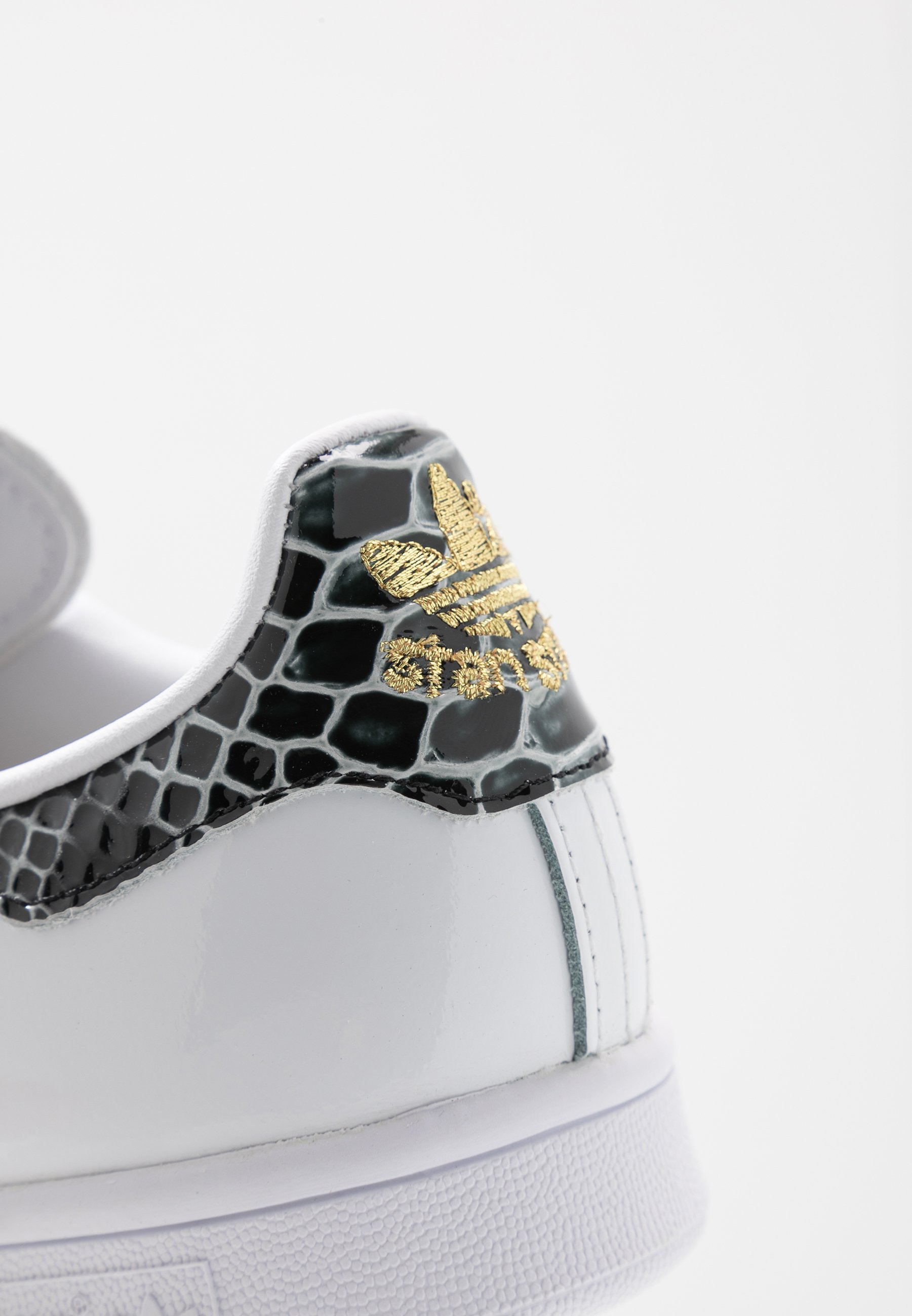 stan smith white black gold