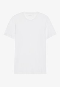 Άσπρο βαμβακερό μπλουζάκι με κοντά μανίκια, στρογγυλή λαιμόκοψη και ομαλή υφή. Απλός σχεδιασμός χωρίς σχέδια ή διακοσμήσεις.