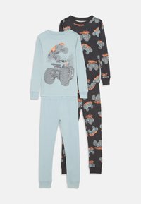 Pyjama deux pièces pour enfants comprenant un haut bleu clair avec un motif de camion monstre et un bas noir orné d'un motif de camions monstres en continu.