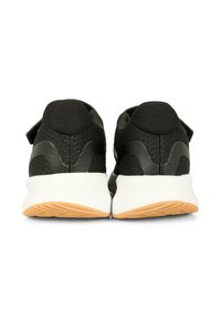 Zwarte sportieve schoenen met een bovenwerk van mesh, getextureerde accenten, klittenbandsluiting en een witte tussenzool. Bovenwerk van gumrubber met een gepatroniseerde loopzool.