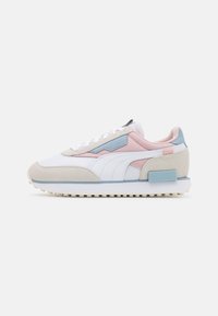 White sneakers with light pink, blue, and grey accents. Features a mix of mesh and suede materials, textured side panels, and a thick white sole.