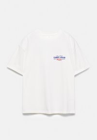 White short-sleeve T-shirt with small blue text "Candy Lover" and a red candy graphic on the left chest area.