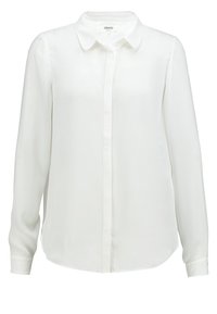 Blusa blanca de manga larga hecha de tejido suave, con cuello clásico, cierre de botones en la parte frontal y un dobladillo ligeramente curvado.