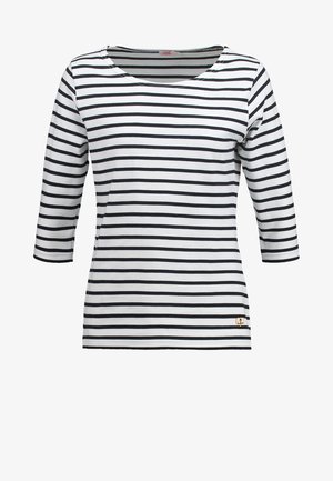 Pasiasta bluzka z długim rękawem w białym i czarnym kolorze, z okrągłym dekoltem, wykonaną z miękkiego materiału, z małym emblematem kotwicy na dolnym hemie.