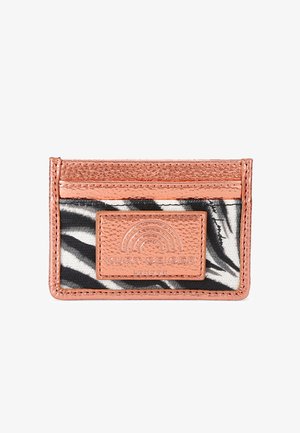 Metallic rose gold and black-and-white zebra patterned cardholder with embossed Kurt Geiger logo patch on front.