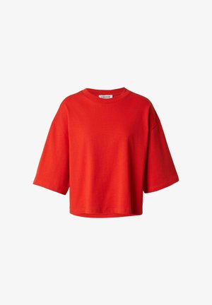Felrode, loszittende, korte mouwen cropped T-shirt met een ronde hals en een zachte stoftextuur.