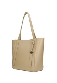 Beżowa skórzana torba na ramię z dwiema długimi rączkami, gładką fakturą, pionowymi szwami i małym akcentem logo z boku.