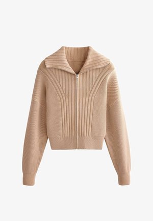 Bézs színű bordázott kötött cipzáras pulóver széles gallérral, hosszú ujjakkal és enyhén rövidített fazonnal.