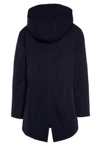 Námořnický modrý sweatshirt s kapucí, se středním střihem, bočními rozparky a viditelnými švy.